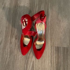 Never been worn red heels